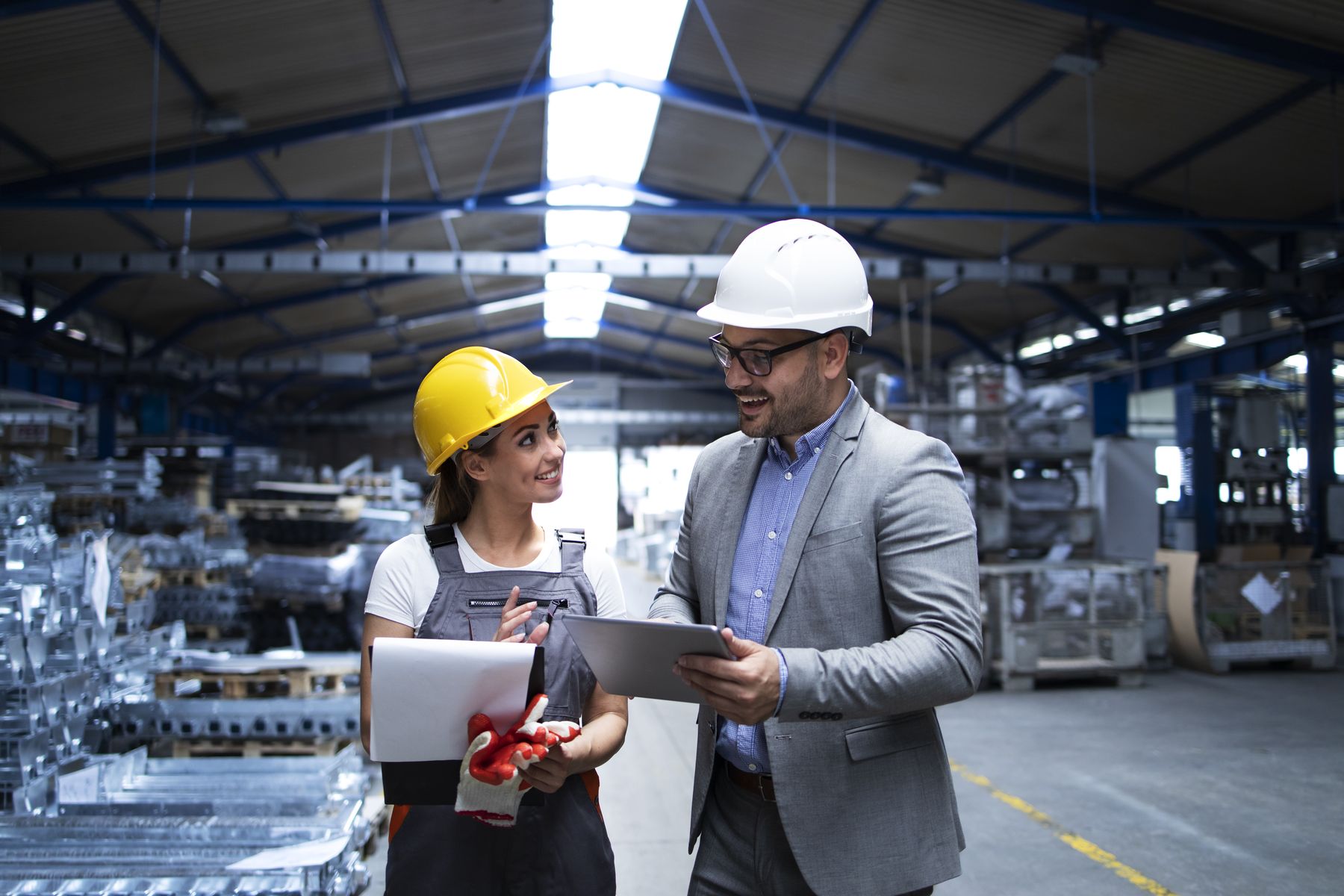 Supervisor and engineer reviewing production on the shop floor